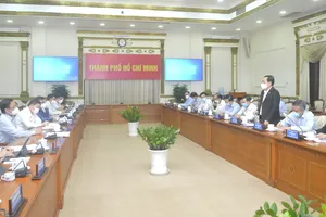 Bộ trưởng Bộ KH-CN Huỳnh Thành Đạt làm việc với lãnh đạo UBND TPHCM. Ảnh: CAO THĂNG