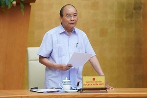 政府總理阮春福在會上致詞。