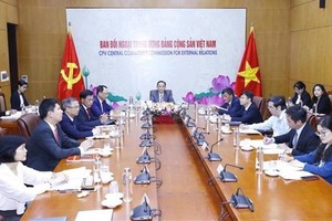 越南共產黨代表團以視頻形式出席了中國共產黨與世界馬克思主義政黨論壇。 圖自越通社