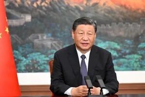 中共中央总书记、中华人民共和国主席习近平。图片来源：新华社/越通社