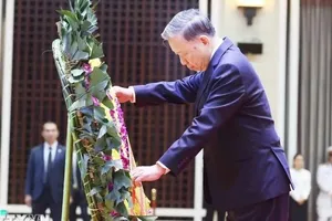 苏林总书记率团吊唁老挝原国家主席坎代.西潘敦。