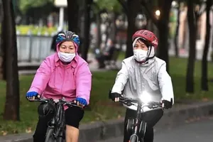 胡志明市清晨出现微凉天气。