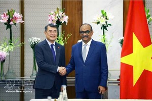 政府总理黎明兴会见印度GMR集团主席格兰德希·马利卡朱纳·劳。图自越通社 