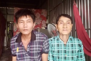 黎屋正与罹患精神病幼子求助。（病人供图）