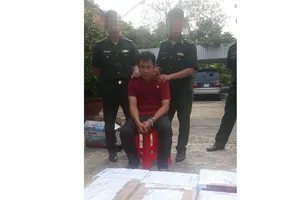 Đối tượng Trương Quốc Cường và tang vật chuyên án