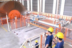 The US has been carrying out antidumping investigation on made-in-Vietnam plywood. (Photo: SGGP)