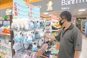 Antimicrobial face masks are sold at an outlet of Saigon Co.op. (Photo: SGGP)