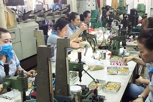 Components manufacturing for export at a mechanical enterprise in Ho Chi Minh City. (Photo: SGGP)