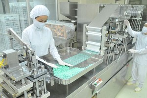Manufacturing products for domestic consumption and export at Agimexpharm. (Photo: SGGP)
