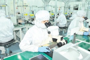 Electronic component production at MTEX Company (Japan) in HCMC. (Photo: SGGP)