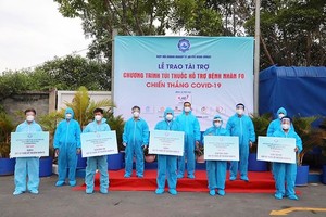 Enterprises timely take care of laborers with Covid-19