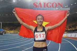 Lê Tú Chinh đoạt HC Vàng ở cự ly 200m. Ảnh: DŨNG PHƯƠNG