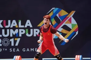 Trịnh Văn Vinh đoạt HCV nội dung 62kg môn Cử tạ nam. Ảnh: DŨNG PHƯƠNG