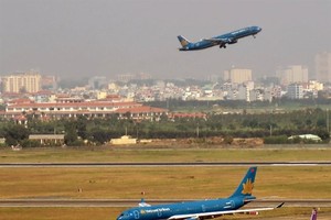 A runway, a terminal and an airplane parking and technical maintenance area will be added to the Tan Son Nhat Airport in HCM City (Photo: VNA)