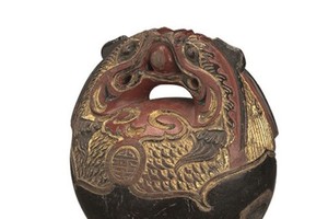 A wooden bell in the collection