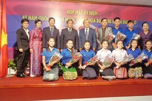 The ceremony marking the 42nd anniversary of Laos’ National Day is held in HCM City. (Photo: VOH)