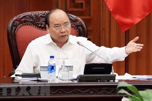Prime Minister Nguyen Xuan Phuc addresses the meeting (Photo: VNA)