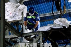 Hazardous medical and industrial waste is brought to the HCM City Urban Environment Company Limited’s treatment plant in Hoc Mon district’s Dong Thanh commune.(Photo: VNA)