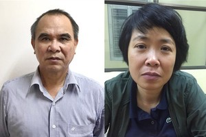 Former General Director of State-run telecom firm Mobifone Cao Duy Hai (L) and incumbent Deputy General Director of the company Pham Thi Phuong Anh (Photo: Ministry of Public Security)