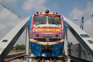 A train travels on the Ghenh Bridge. Most bridges on the railway connecting Hanoi and HCM City were built a century ago using French standards with low capacities. (Photo: VNA/VNS)