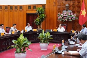 At the meeting (Photo: VNA)