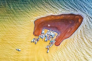 “The source of income of fishermen” by Ngo Thi Thu Ba