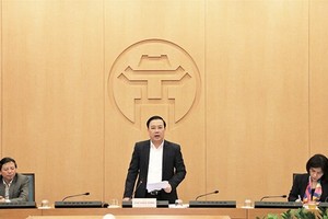 Vice Chairman of the Hanoi People’s Committee Chu Xuan Dung speaks at the meeting (Photo: VNA)