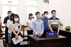 The defendants at the trial (Photo: VNA)