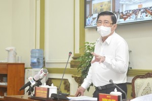 Chairman of the People’s Committee of HCMC Nguyen Thanh Phong speaks at the conference. (Photo: SGGP)