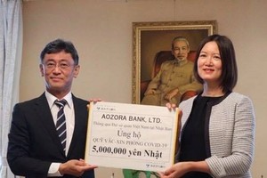 At the handover ceremony (Photo: VNA)