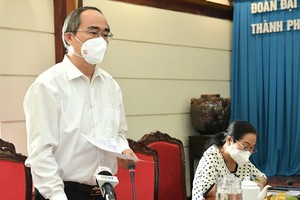 Deputy Nguyen Thien Nhan speaks at the meeting. (Photo: SGGP)
