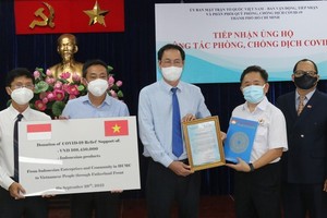 ​At the receiving ceremony (Photo: SGGP)