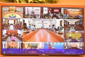  Deputy Prime Minister Le Van Thanh chairs a nationwide teleconference to discuss the resumption of domestic commercial flights. 