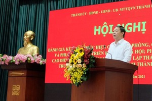 Vice chairman of the People’s Committee of HCMC Duong Anh Duc speaks at the meeting. (Photo: SGGP)