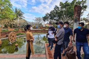Tourists visit Thanh Ha pottery village  in the city of Hoi An, Quang Nam province.