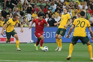 Vietnam (in red) lost 4-0 to Australia on January 27 (Photo: Vietnam Football Federation)