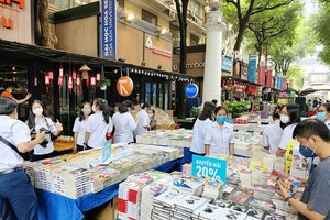 Readers attend a book fair at HCMC Book Street in April. 