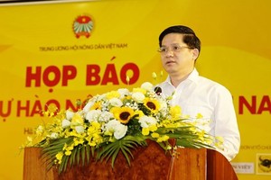 Standing deputy chairman of the Central Committee of the Vietnam Farmers' Union Pham Tien Nam speaks at the event.