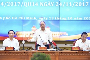 President Nguyen Xuan Phuc speaks at the meeting. (Photo: SGGP)
