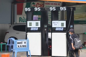 A gas station announces to run out of gasoline.