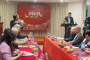 At a seminar on special publications covers marking Tet holidays