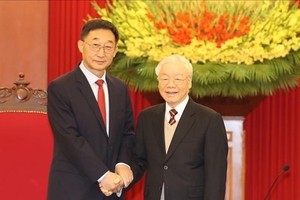 Party General Secretary Nguyen Phu Trong receives Liu Ning, Secretary of the Party Committee of the Guangxi Zhuang Autonomous Region, in Hanoi on March 31. (Photo: VNA)