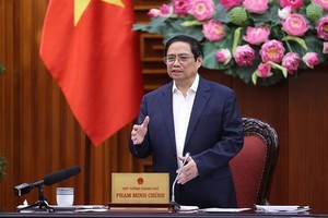 Prime Minister Pham Minh Chinh addresses the meeting (Photo: VNA)