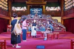 Artists from the Japan Philharmonic Orchestra check a performance site in central Vietnam. (Photo courtesy of Tomo Usuda)