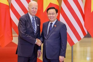 National Assembly (NA) Chairman Vuong Dinh Hue receives US President Joe Biden, at the NA House in Hanoi on September 11. (Photo: SGGP)
