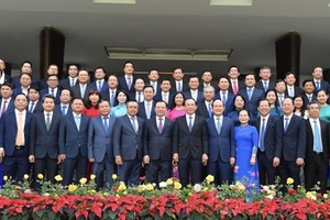 Deputies of Hanoi and HCMC attend the conference. (Photo: SGGP)
