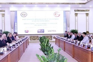 Participants at the meeting. (Photo: VNA)