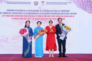 Participants at the ceremony to mark the 65th anniversary of the National Day of Cuba (January 1, 1959 – 2024) in HCM City on December 12 (Photo: VNA)