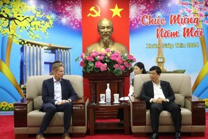 At the meeting (Photo: VNA)