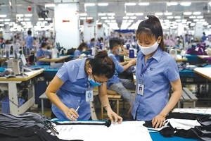 Labor productivity is one of the indicators of enhancing national competitiveness. (Photo: SGGP)